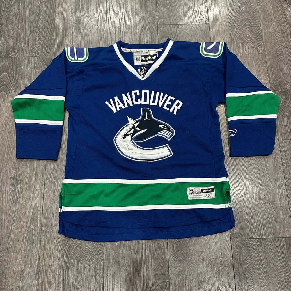 Reebok Vancouver Canucks NHL Youth Jersey Size L/XL Blue Green Hockey Sewn Logo